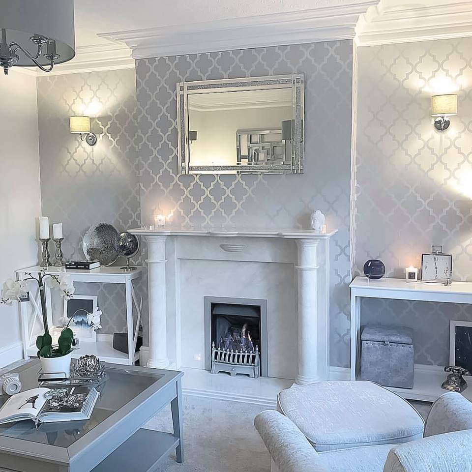 All White and grey living room with fireplace